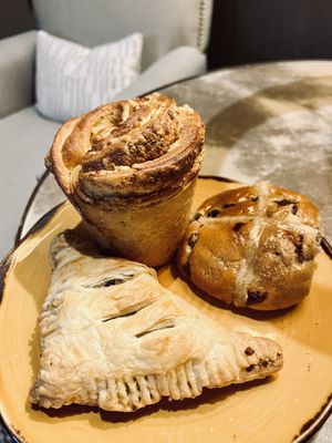Cheese muffin, hot cross buns and a haggis turnover   at Black Rabbit in Edinburgh