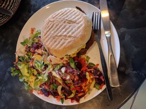 Egg & bacon roll with beet salad on the side at Black Rabbit in Edinburgh