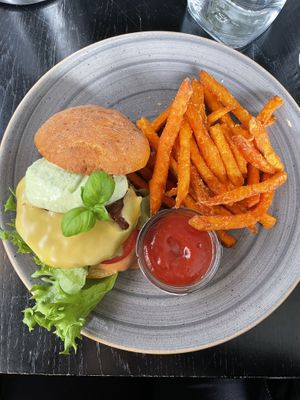 Vegan burger with sweet potato fries  at Kivi Paber Käärid in Tallinn