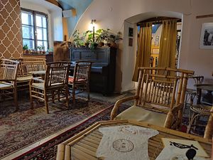 Inside seating options at Dobrá Cajovna in Kutna Hora