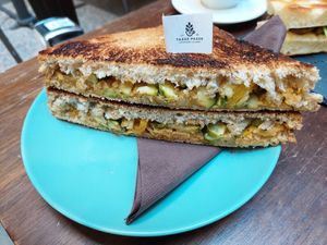 Sandwich with hummus, dried tomatoes and baked vegetables at Tazze Pazze in Genoa