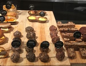 Some of these items are vegan (highlighted by green V) at Gregory's Coffee - 3rd Ave in New York City