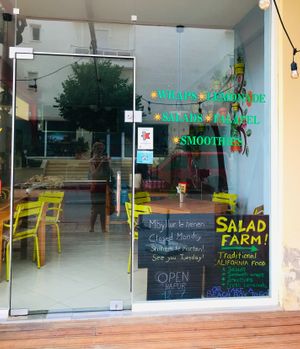 Salad Farm window. Closed Mondays. at Pat's Deli Farm in Sarande