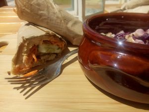 Hummus wrap and cabbage side salad at Pat's Deli Farm in Sarande
