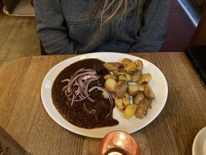 goulash with potatoes and cumin  at Maitrea in Prague