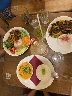 Asian wok bowl (top left), Asian wok (top right), Thai red curry (bottom)  at Maitrea in Prague