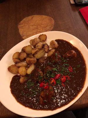 Veganized goulash with potatoes at Maitrea in Prague