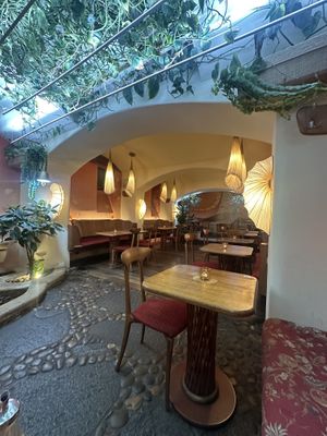 Underground seating area  at Maitrea in Prague