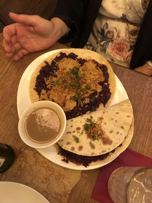 Lokše - potato pancakes with mock meat, cabbage and gravy  at Maitrea in Prague