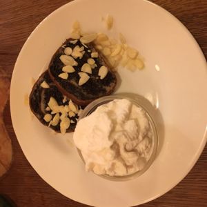 Raw apple strudel with vegan whipped cream. at Maitrea in Prague