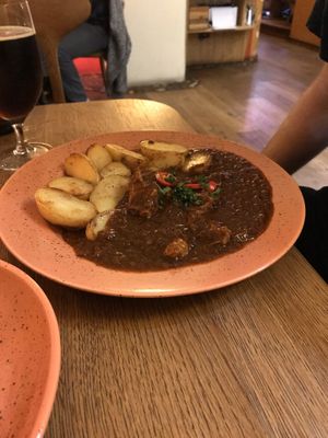 Vegan goulash - vegan option is served with potato rather than dumplings  at Maitrea in Prague