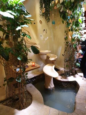 Fountain in downstairs seating area at Maitrea in Prague