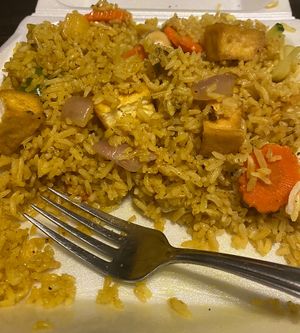 Vegan pineapple fried rice w added tofu & mixed vegetables. So good and such good portions  at Aroi Thai Food in Colorado Springs