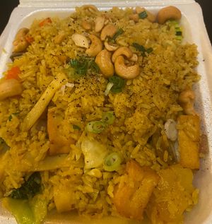 Vegan pineapple fried rice w added tofu & mixed vegetables. So good and such good portions  at Aroi Thai Food in Colorado Springs
