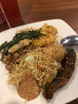 Sorry for the quality- there’s sweet tempeh, corn fritter, potato cake, mi goreng, long beans with tempeh and eggplant (spicy) cost 30K ($3AUD)  at Bu Mi in Canggu