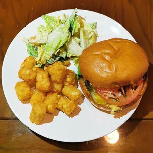 Mimi Burger, tater tots, Caesar salad at Mimi & Jones in Montreal