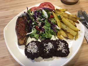Beet “Burgers”, Eggplant, potato fries and salad. Good size portions and delicious!   at Grön Vegan Yard in Nicosia