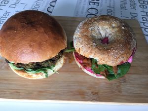 Green mosnter burger (left) and rye bagle with marinated oyster mushroom (bith take away) at Avocado Spot in Gdansk