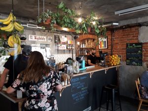 Counter and weekly specials menu on the wall at Avocado Spot in Gdansk