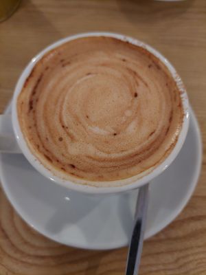 oat milk cappuccino at Fauna & Flora in Lisbon