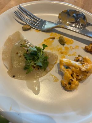 Edamame dumping on left and charred Buffalo cauliflower (two vegan starters) at True Food Kitchen in Jacksonville