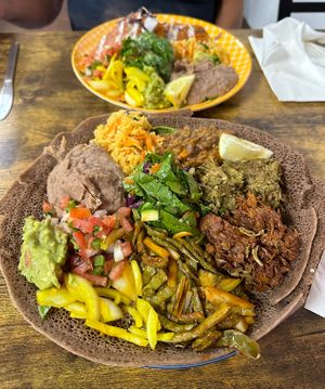 Injera plate and tamales plate  at Tumerico - 4th Ave in Tucson