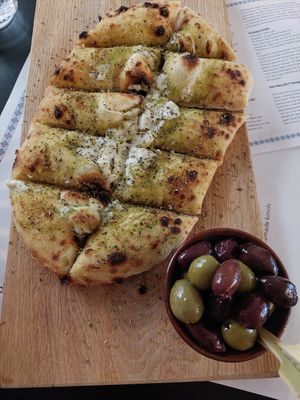 Garlic bread and olives at Plant A Pizza in Ghent