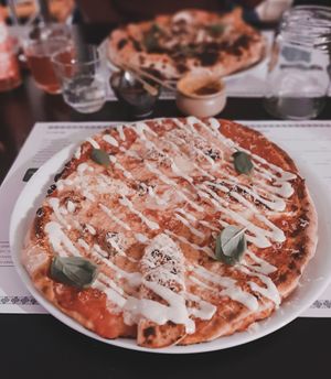 4 Queese Rossa (gf) with cashew mozzarella, sweet blue (vegan butchers choice), first snow (omage) and gondino pecorino at Plant A Pizza in Ghent