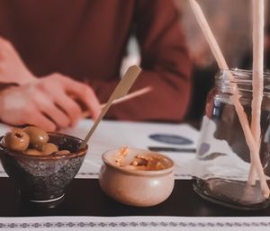olives and a free tofu spread with grissini at Plant A Pizza in Ghent
