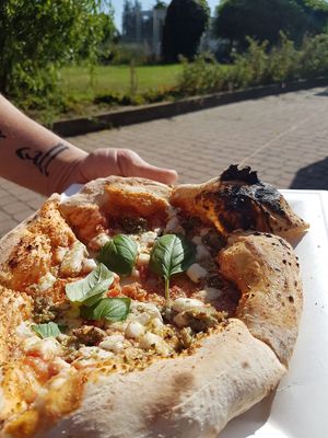 pizza with blue 'cheeze' at Plant A Pizza in Ghent