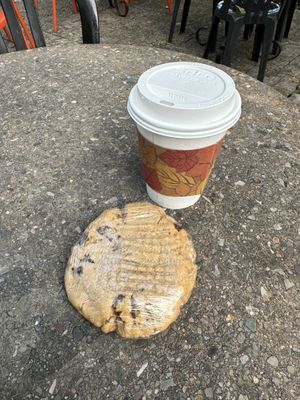 Chai tea with oat milk. And peanut butter chocolate chip cookie 🍪   at Orange Cat Coffee Co. in Lewiston
