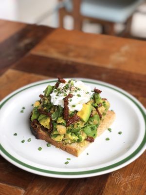 Avocado, Chickpea and Sun-dried Tomato Toast with optional poached eggs  at Pilgrim in Kampot