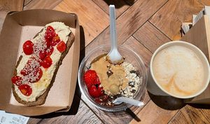 Hummus Toast, Cacao-Peanutbutter-bowl, Oat Cappuccino  at Base V Juicery - Via dei Neri in Florence