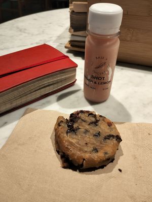 Chocolate chip cookies with pinut butter+ginger lemon shot. All veg at Base V Juicery - Via dei Neri in Florence