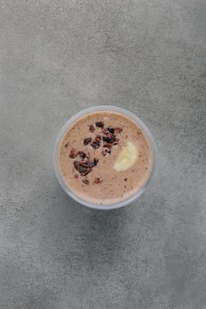 Our Sweet Boy smoothie made with home made Oat Milk, banana, raw cacao, home made peanut butter and dates at Base V Juicery - Via dei Neri in Florence