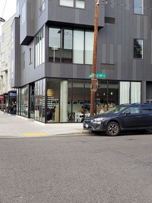 On the corner.. little sign at Happy Day Juice - Northeast in Portland
