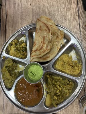 Parotta with five curries  at Vegano in Bremen
