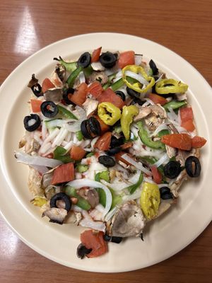 Mini vegan pizza on deep crust with banana peppers - very good!   at Jim's Razorback Pizza in Fort Smith