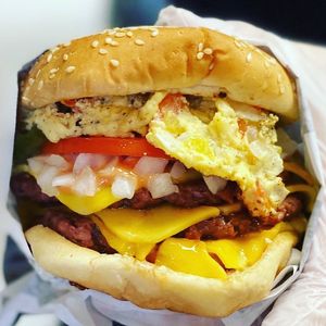 The Three of a Kind worked with scramble eggs at VBurger in Long Beach