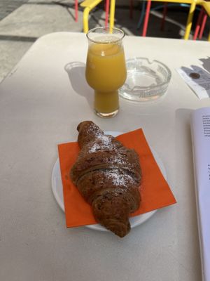 Orange juice and lemon ginger croissant (all vegan)  at Bianconiglio Bistrot in Bellinzona