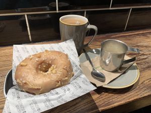Vegan peanut butter ring doughnut and Earl Grey tea with oat milk  at Tantrum Doughnuts in Glasgow