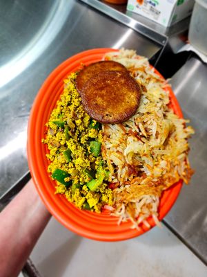 Vegan Get 'er Done: hash browns, before the Butcher Vegan Sausage, Hartland diner tofu Scramble (add grilled onions and peppers). at Hartland Diner  in Hartland