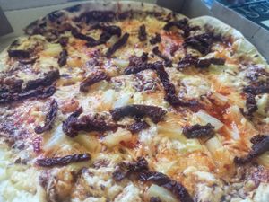 Delicious Thai Pizza at Mega Hea Pizza in Tallinn