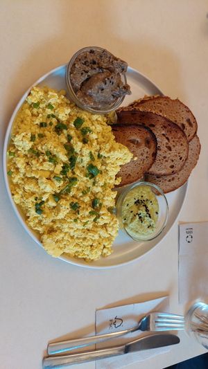 Tofu scramble with bread and spreads at Plant Base in Berlin