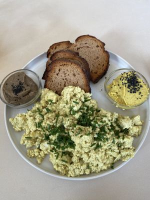 Tofu scramble (option two with more bread and two spreads)  at Plant Base in Berlin