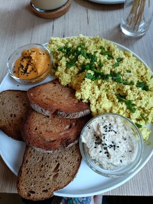 Tofu scramble with extra bread and dips (option 2 on menu) at Plant Base in Berlin