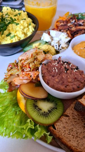 Spicy kimchi and tasty dips 🌱😊👍 at Plant Base in Berlin