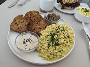 Tofu scramble menu, gluten free option. at Plant Base in Berlin