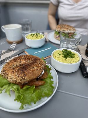 Salmon bagel and tofu scramble   at Plant Base in Berlin