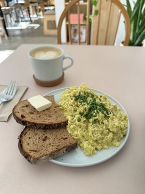Scrambled Tofu & Café Latte   at Plant Base in Berlin